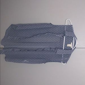 A blue blouse with white flowers